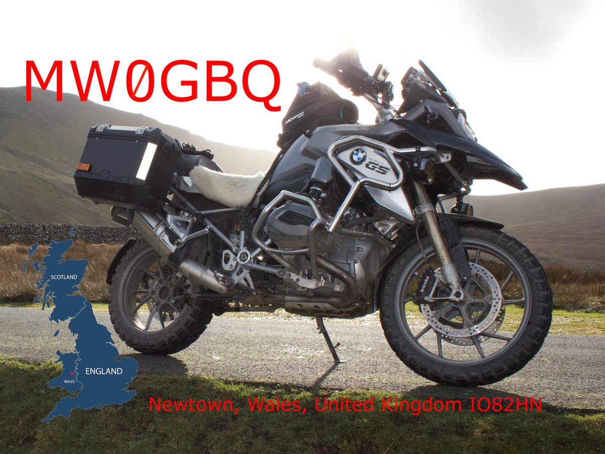QSL card from MW0GBQ — a BMW GS motorcycle on a mountain road in Wales, with the callsign MW0GBQ and 'Newtown, Wales, United Kingdom, IO82HN'.